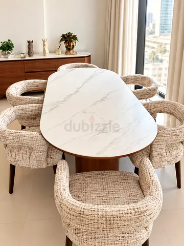 Solid wood dining table with marble-look top and 6 upholstered swivel chairs