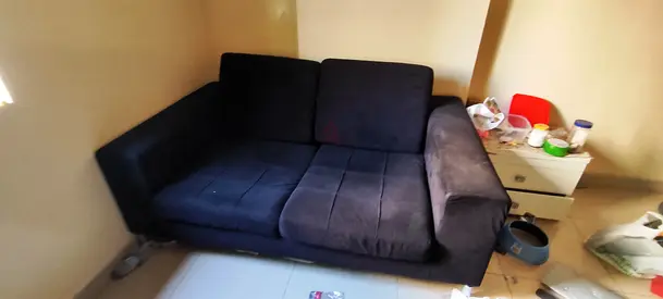 Compact black 2-seater sofa - good condition