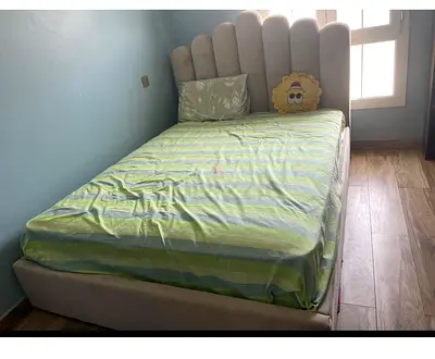 Queen  upholstered bed with scalloped headboard - good condition with mattress