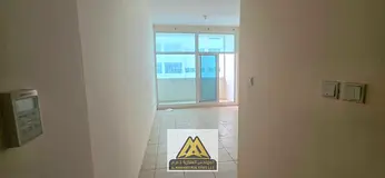 Luxury 2-Bedroom Apartment with Living Room | Ajman One | Parking | 2 Balconies | Wardrobes | Centra