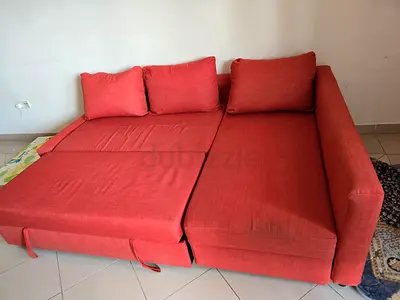 Ikea L-shaped sofa bed with storage - good condition