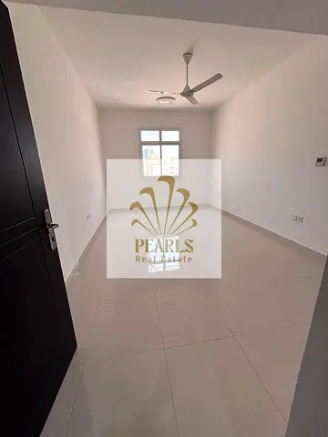 Brand-new 2-bedroom apartment in Al Rashidiya 2, Ajman, with 2 master bedrooms, open view, balcony