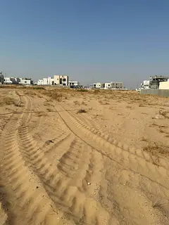 A prime residential plot for sale in the Al-Hoshi area of Sharjah.