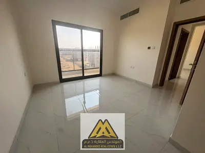 2-bedroom in Al Alia, Ajman, excellent balcony and central AC. AED 42,005 yearly, payable in 4 or 6 installments.