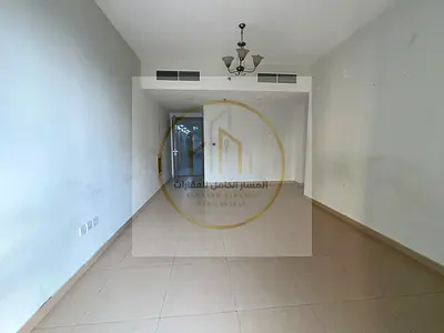An exceptional two-bedroom apartment with a living area available for annual rent; it features high-quality finishes and spacious interiors, and is lo