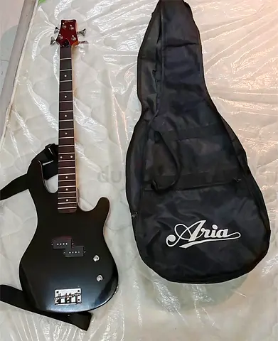 Ashton Bass Guitar with bag Need Strings. Good Condition