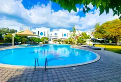 4BR Compound Villa | Shared Pool & Garden