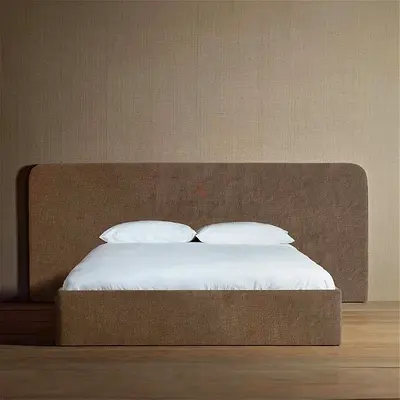 Brown upholstered bed frame with large curved headboard - Queen/King