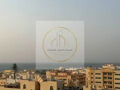 🌊 2-Bedroom Apartment with Sea View in Al Qulayaah, Sharjah –