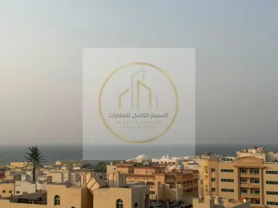🌊 2-Bedroom Apartment with Sea View in Al Qulayaah, Sharjah –