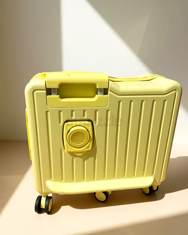 Compact yellow hard-shell carry-on suitcase with 360° wheels