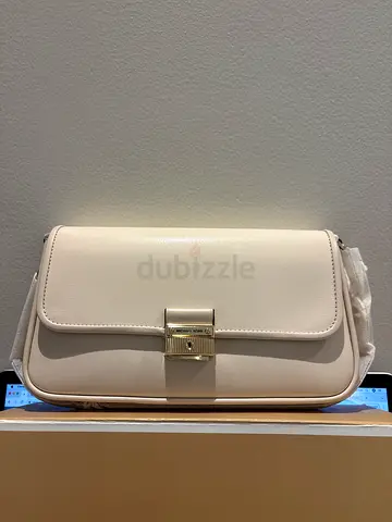MK - Cream leather crossbody bag with gold-tone clasp