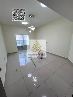 One-bedroom apartment with a living room for annual rent in Al Nuaimiya 1