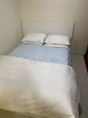 Full concrete room with attached bathroom in a secured family community available