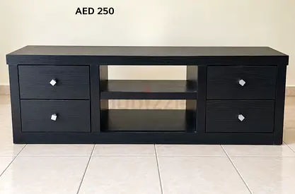 Dark wood TV cabinet with drawers and center shelving - Good condition