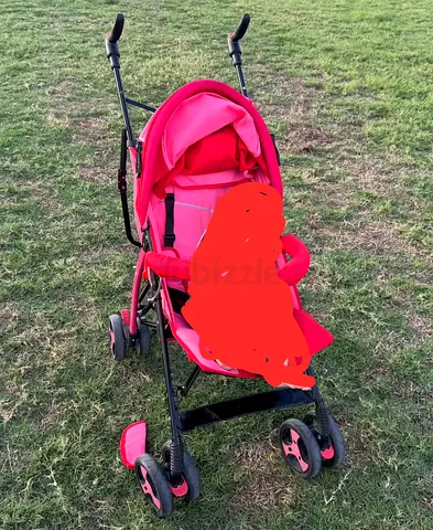 Lightweight pink umbrella stroller – compact and foldable