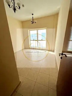 Spacious 2-Bedroom Apartment for Annual Rent in Al Taawun with Balcony, Free AC, Prime Location Near