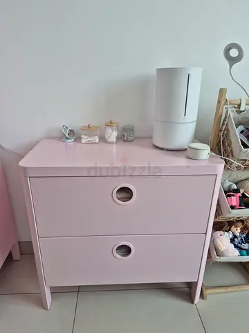 Pink children's dresser with two drawers