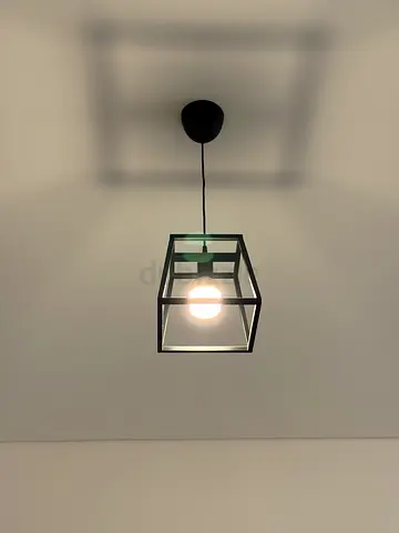 Modern Black Cage Wall Lamp - Single Light Fixture. Asking 200 aed