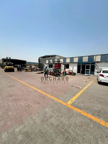 30 meter wide street/20000 Sqft and fully equipped with interlocking,water/High power 250kva/11 office,2 bathroom/kitchen/Rent 400000 Aed/Inds area 17
