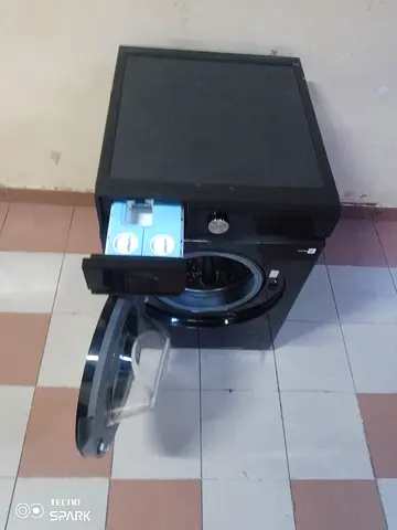 Samsung Washer Dryer Combo (Model: WD11BB944DGBGU) in Black Caviar finish. Capacity: 11.5 kg washing