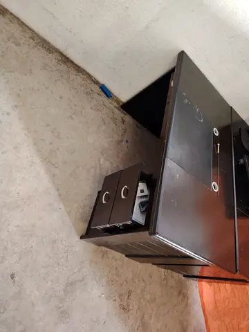 Dark wood office desk with under-drawer storage — good condition