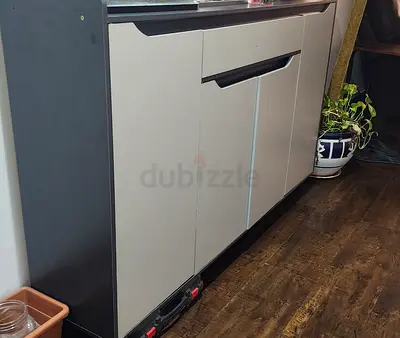 Shoe cabinet and open shelves