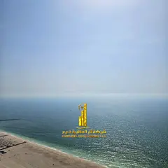 Two-bedroom apartment with a living room and a sea view for monthly rent at Corniche Residence Tower