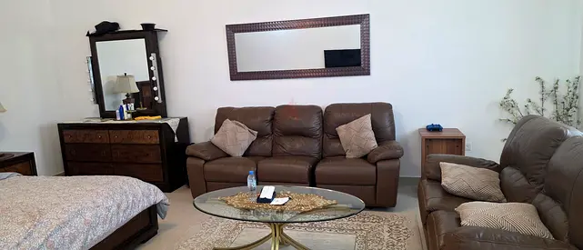 Used brown leather 3-seater sofa set with matching loveseat and cofee table and carpet for free