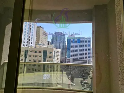 2-bedroom apartment in Al Taawun, Sharjah, with a maid’s room or storage, open-view balcony, built-in wardrobes, and 4 or 6 instalments.