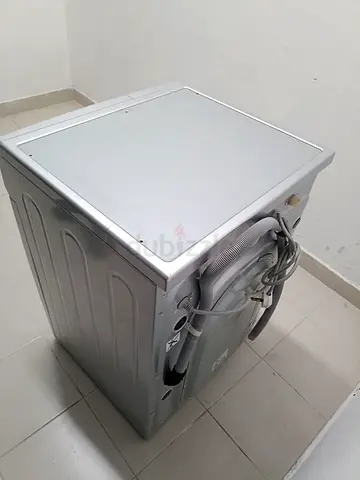 Silver front-load washing machine - good working condition