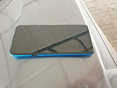 Used blue smartphone with minor wear — good working condition