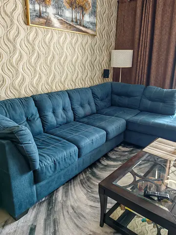 Blue L shaped Sofa from United Furniture