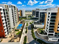 Boulevard & Pool View | Prime 1BR | on Crystal Lagoon