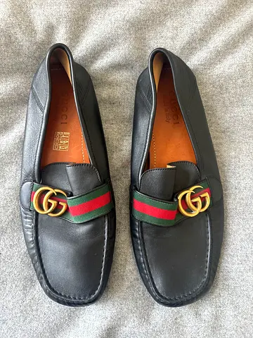 Black leather Gucci loafers