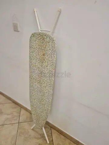 Foldable ironing board in good used condition