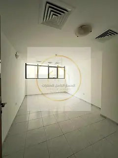 Spacious 3 Bedroom Apartment for Rent in Abu Shagara on Al Wahda Street with Large Spaces, Free AC, 