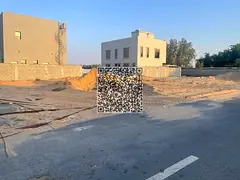 Residential/investment land for sale in Al Helio 2, Ajman, with a permit for the construction of a v