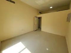 Two master bedrooms and a separate living room, located opposite the Al Nuaimiya Towers; utilities i