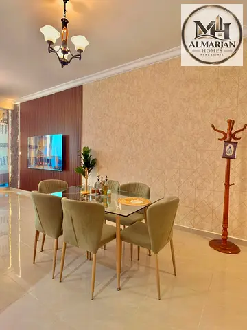 Own a furnished two-bedroom apartment with a living room on the Ajman Corniche, available with a monthly payment plan. The property offers a sea view
