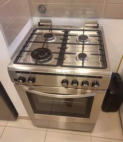Stainless Steel 4-Burner Gas Cooker with Oven - Good Condition