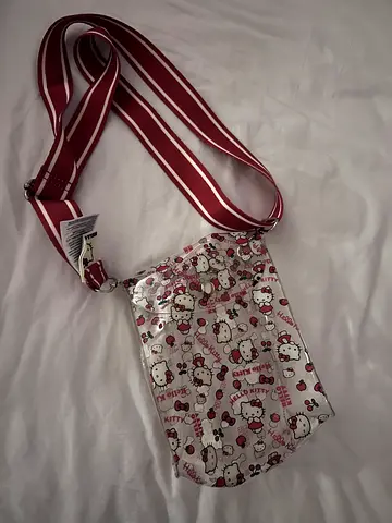 Hello Kitty clear crossbody bag with red striped strap