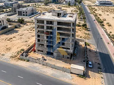 FREEHOLD G+P+5 /30 apartment building In Tilal city Sharjah