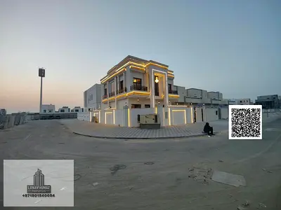 Villa for sale in Ajman, Al-Zahia area. 6 master bedrooms, majlis, living room, and maid's room. Bank financing available.