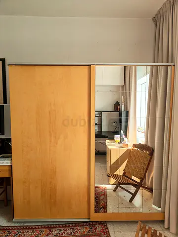 Light wood 2 sliding doors wardrobe with hanging rails and extendable shoe shelves