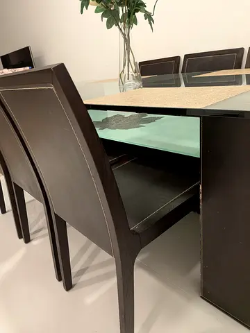 Dark wood glass-top dining table with 6 matching chairs