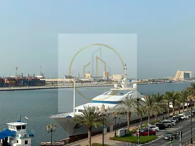 A great opportunity to rent a 2-bedroom apartment in Al Jubail, Sharjah, featuring a side view and a prime location on the first row of the Corniche.