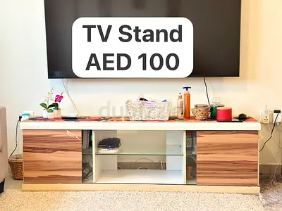 Low TV Stand / Entertainment Unit - White with Wood Panels - AED 100