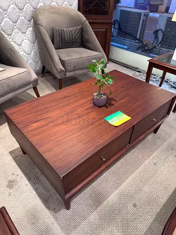 Multiple furniture items including tables and chairs made with special rosewood.