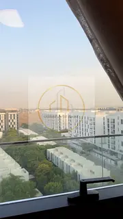 **Furnished with Balcony | Pool, Gym & Parking | Aljada – Masaar 4 | AED 65,000** **1 Bedroom + Li